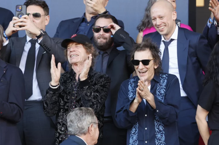 Mick Jagger attends 'clasico' soccer game. Barcelona wears Stones logo against Real Madrid