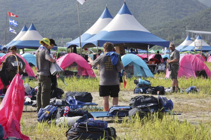 Tens of thousands of young scouts to leave South Korean world jamboree as storm Khanun looms