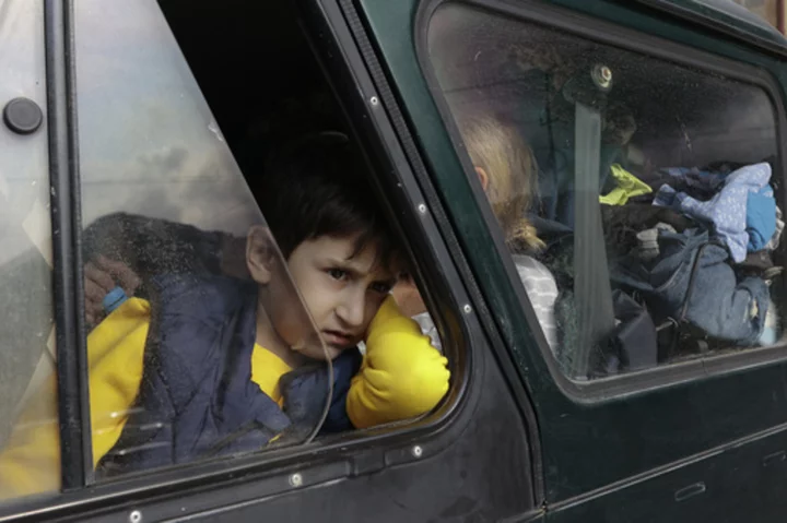 AP PHOTOS: Tens of thousands of Armenians flee in mass exodus from breakaway region of Azerbaijan