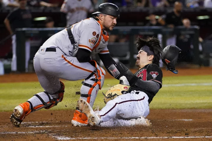 Carroll, Marte use daring double steal to push the Diamondbacks past the Giants 8-4