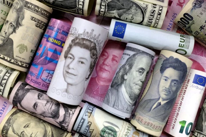 Dollar edges up vs pound, euro on Fed support; yen stronger