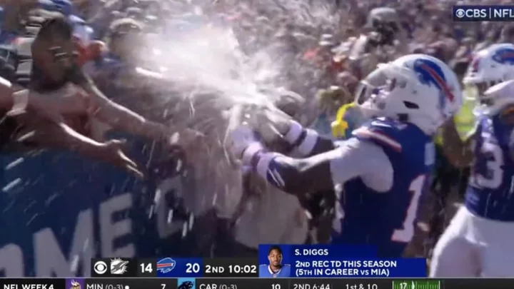 Stefon Diggs Celebrates Touchdown By Grabbing Beers From Fans, Smashing Them Together