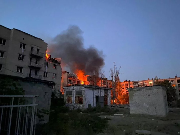 Ukraine says Russian missiles hit apartment, kill eight, survivors describe fiery blasts