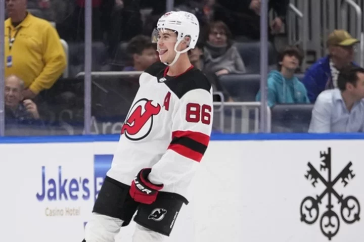 Jack Hughes has 2 goals and 2 assists, including OT winner, as Devils top Islanders 5-4