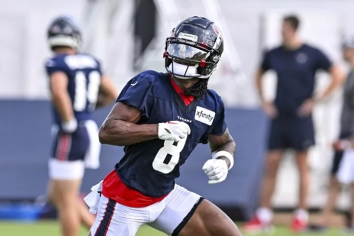 Texans WR Metchie on field for 1st day of camp after missing last year following cancer diagnosis