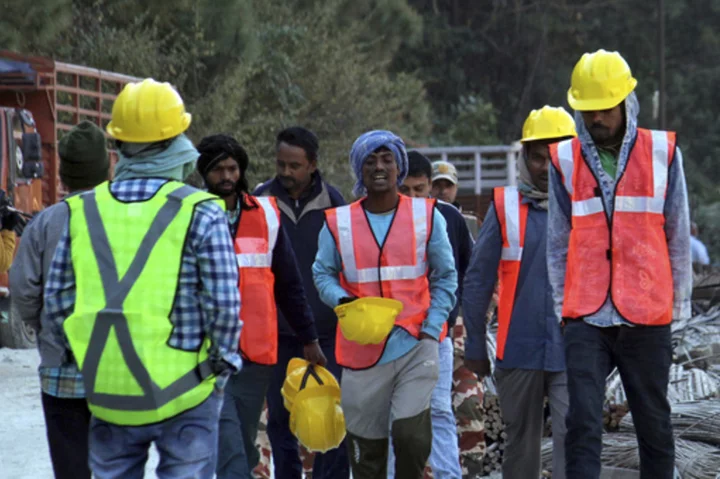 In India, 40 workers are trapped in a tunnel for a 7th day as rescuers wait for a new drill