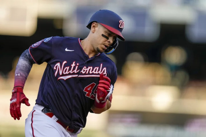 Joey Meneses homers, drives in 3 runs as the Nationals rally past the Brewers 5-3