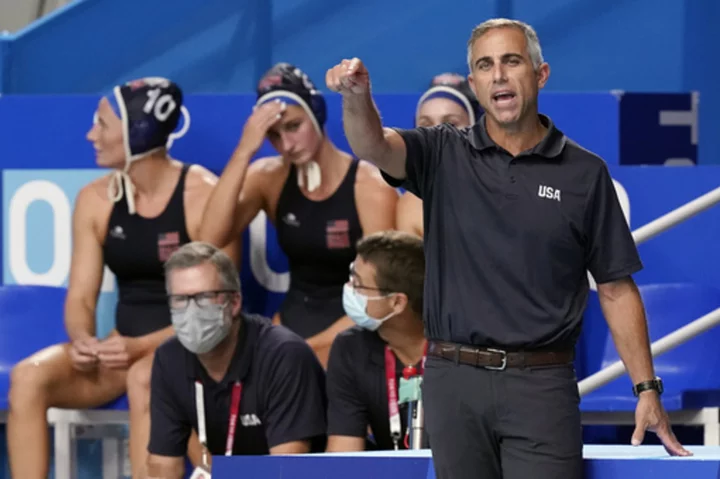 US women's water polo swimming through choppy water in pursuit of a fourth straight Olympic gold