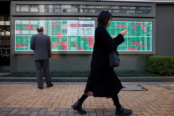 Asia stocks rise amid Fed pause talk, debt bill passage