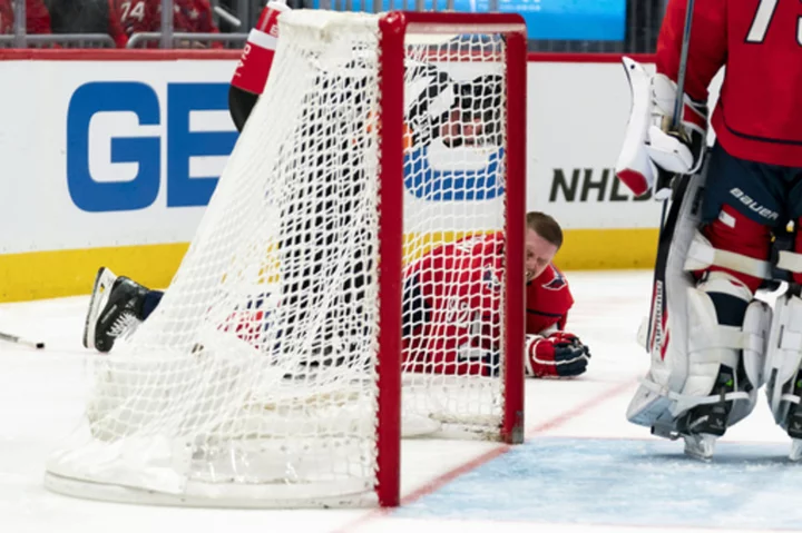 Vegas' Paul Cotter ejected for an illegal check to the head of Washington's Evgeny Kuznetsov