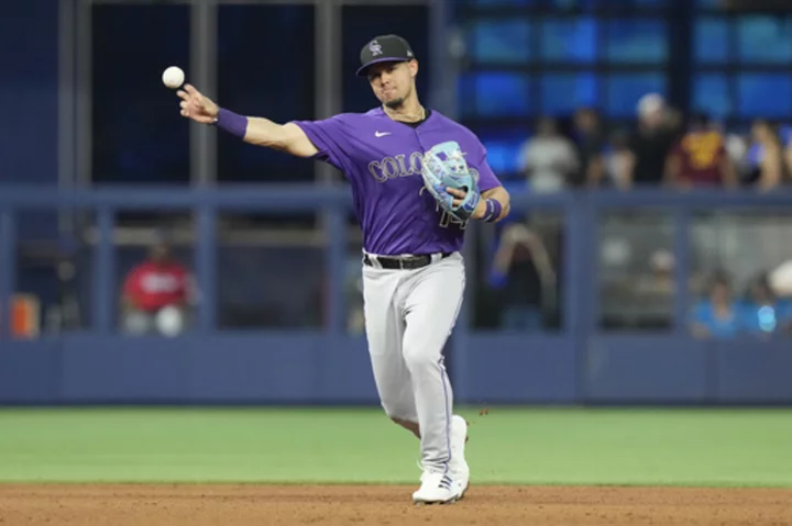 Grichuk's go-ahead RBI single in the ninth rallies Rockies past Marlins 4-3