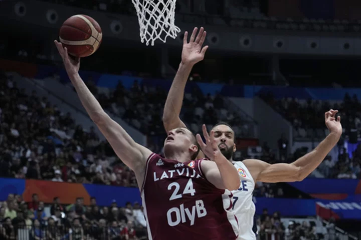 Latvia tops Italy, Lithuania tops Slovenia in Basketball World Cup consolation playoffs