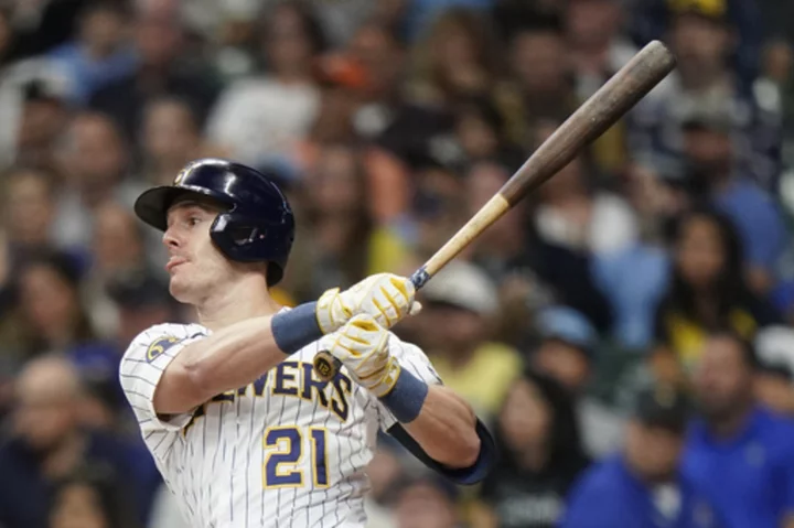 Canha's grand slam in 8th gives NL Central-leading Brewers a 9-5 victory over Nationals