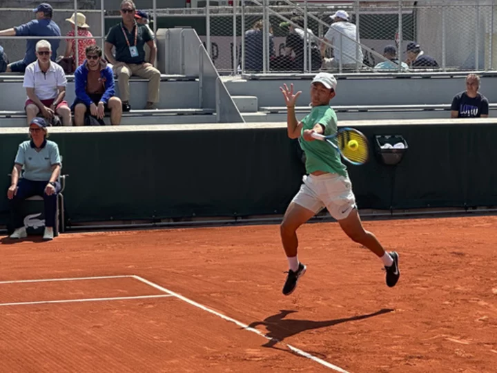 3 Chinese men play at French Open; country's 1st male entrants in Paris since 1937