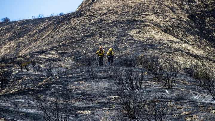 California crews battle wildfires in extreme heat