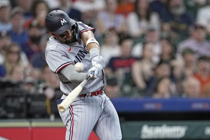 Lewis has 4 RBIs in season debut, Jeffers homers in 10th to give Twins 7-5 win over Astros