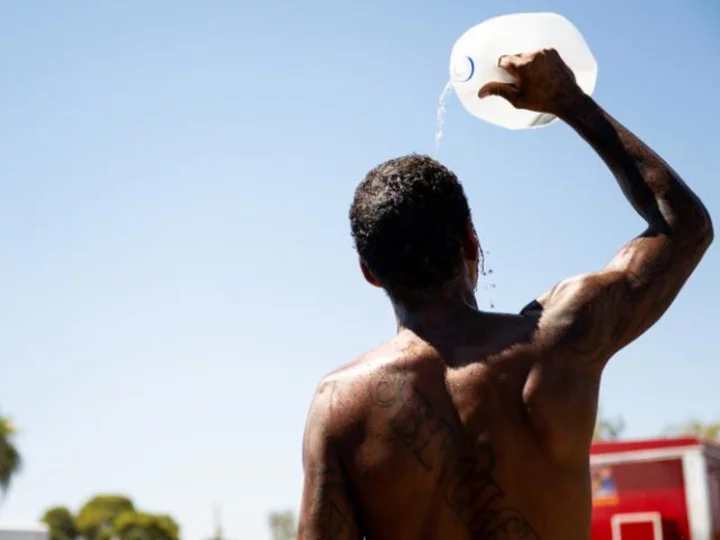 Phoenix ties record streak with 18 consecutive days over 110 degrees as the Southwest swelters under a deadly heat wave