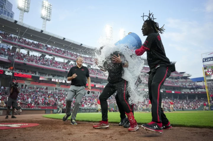 Steer's two-run shot in 11th gives Reds wild 7-5 win over Padres