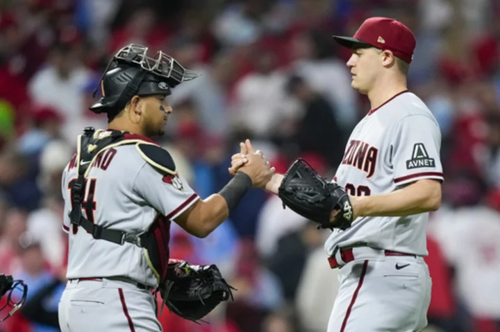 Pham, Gurriel homer, Diamondbacks power past Phillies 5-1 to force NLCS Game 7