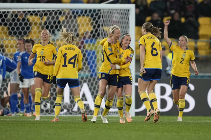 Ilestedt scores twice as Sweden beats Italy 5-0 to reach knockout rounds at Women's World Cup.