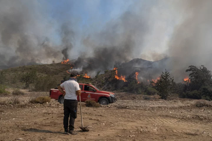 ‘The season is over for us’: Greece prays for tourism as islanders sift through the ashes