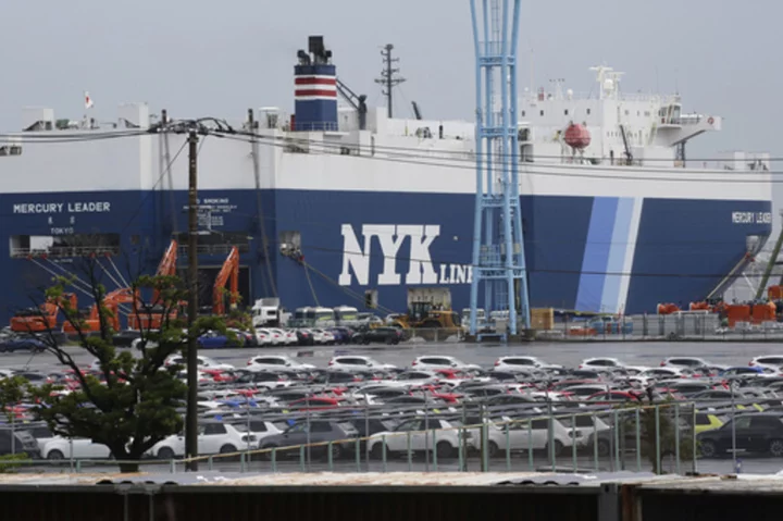 Japan's exports rise and imports decline in September as auto shipments to US and Europe climb