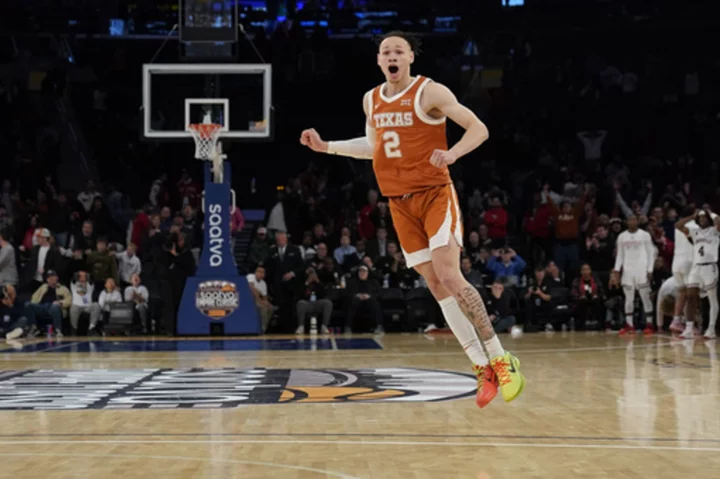 Abmas hits game-winner as No. 19 Texas outlasts Louisville 81-80 in Empire Classic