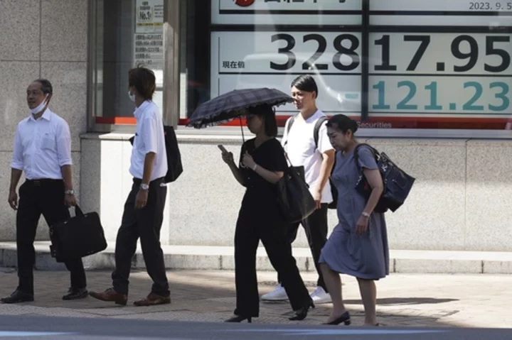 Stock market today: Asian shares weaken while Japan reports economy grew less than expected