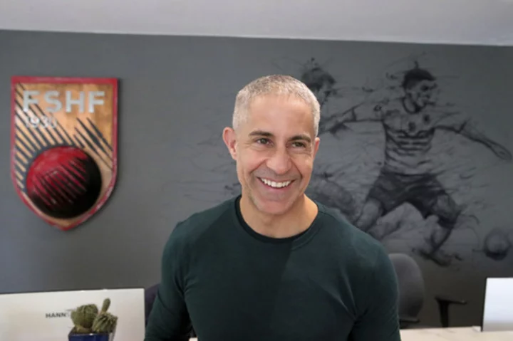 South American coaches lead Albania to Euro 2024 spot. Sylvinho gets a medal from prime minister