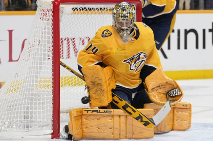 Juuse Saros stops 24 shots as the Predators beat the Flames 4-2, extend winning streak to 3 games