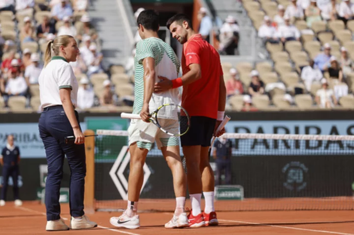 Novak Djokovic nears his 23rd Grand Slam title at the French Open after Carlos Alcaraz cramps up