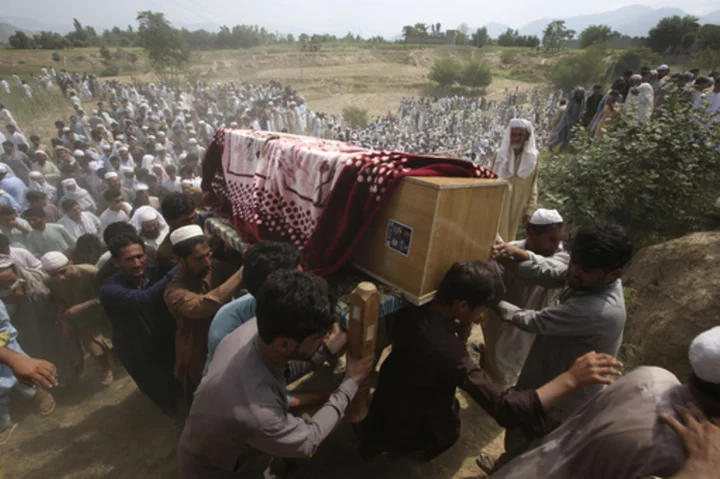 Deaths from IS bombing at Islamist rally in Pakistan rise to 63 after more wounded people die