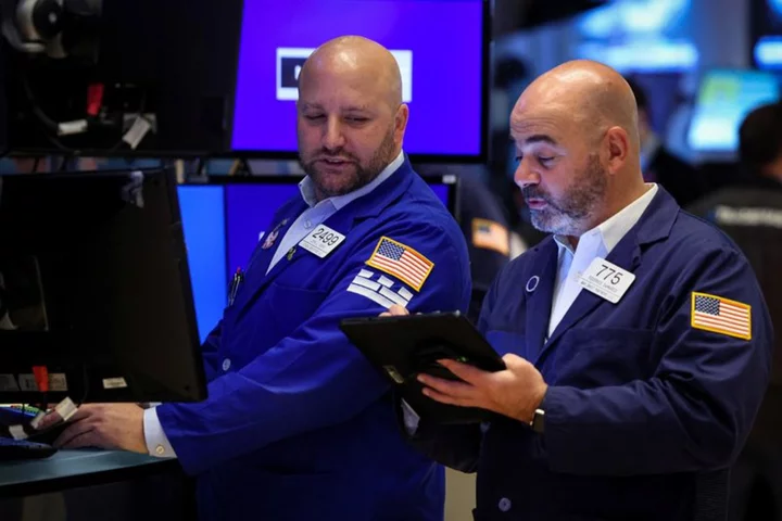 Wall St set for muted open ahead of Fed policy decision