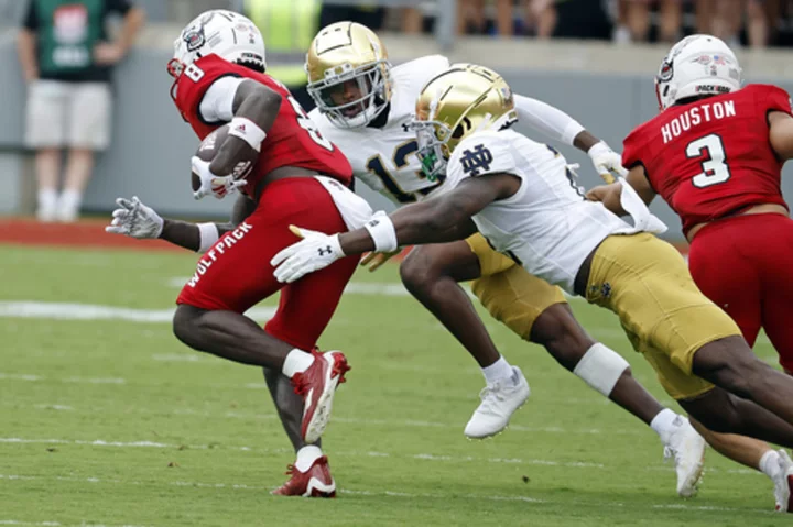 No. 10 Notre Dame beats NC State 45-24 for 29th straight regular-season win against ACC teams