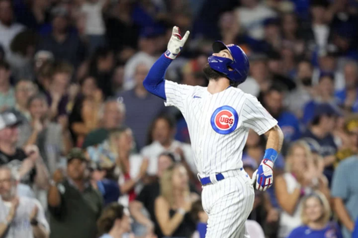 Dansby Swanson homers twice as Chicago Cubs pound Cincinnati Reds 20-9