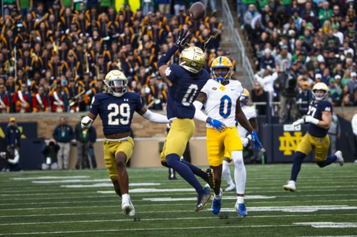 Watts has 2 picks, Estime rushes for 3 TDs, No. 14 Notre Dame routs Pitt 58-7