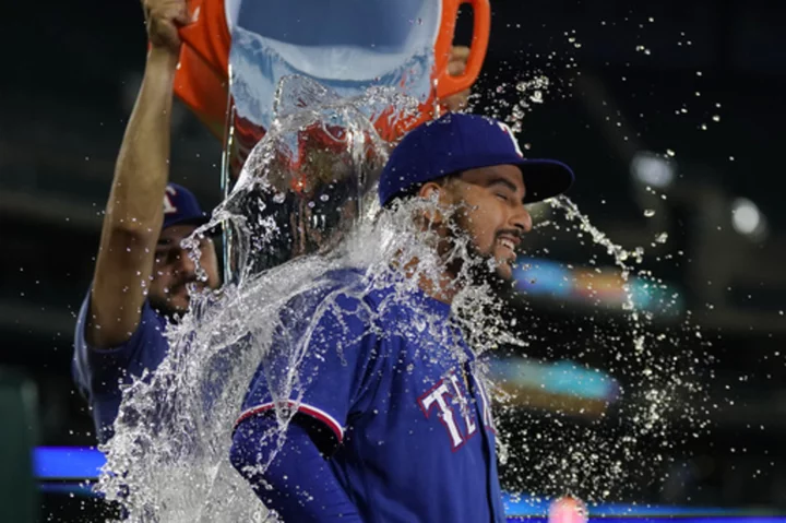 Grant Anderson wins in relief in MLB debut, Rangers beat Tigers 10-6