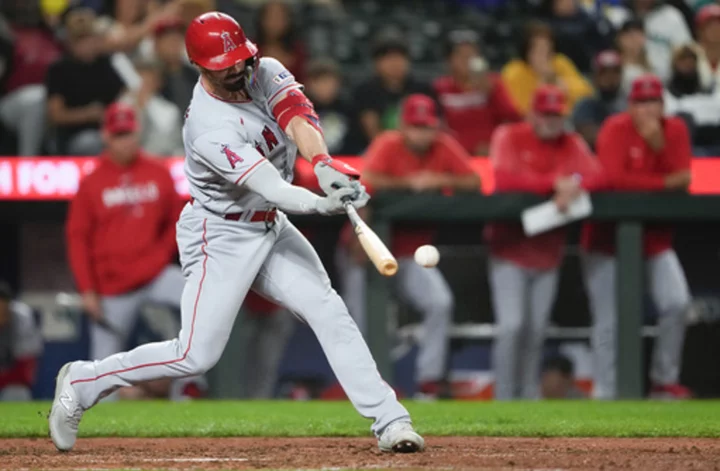 Grichuk has RBI single to key Angels' three-run 11th in 8-5 win over Mariners