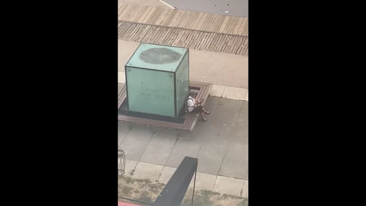 Man calmly eating his sandwich metres from riots dubbed 'Frenchest thing you'll see today'