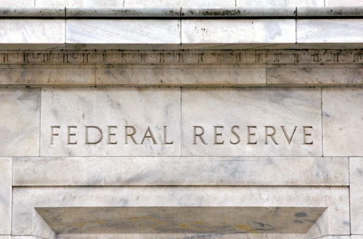 Fed raises interest rates, leaves door open to another increase