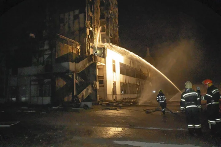 Russian strikes in Ukraine's city of Odesa damage port, grain silo and an abandoned hotel