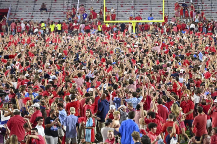 SEC fines Ole Miss $75,000 after fans throw debris on field