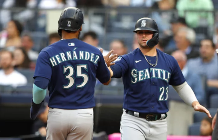 Mariners hammer struggling Germán as Woo gets his 1st win in a 10-2 rout of the Yankees