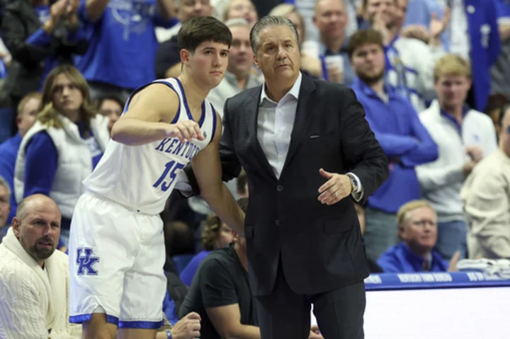 Reed Sheppard leads hot-shooting No. 12 Kentucky past No. 8 Miami, 95-73