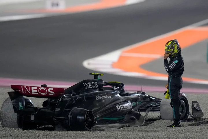 Lewis Hamilton crashes out after first-corner collision with George Russell