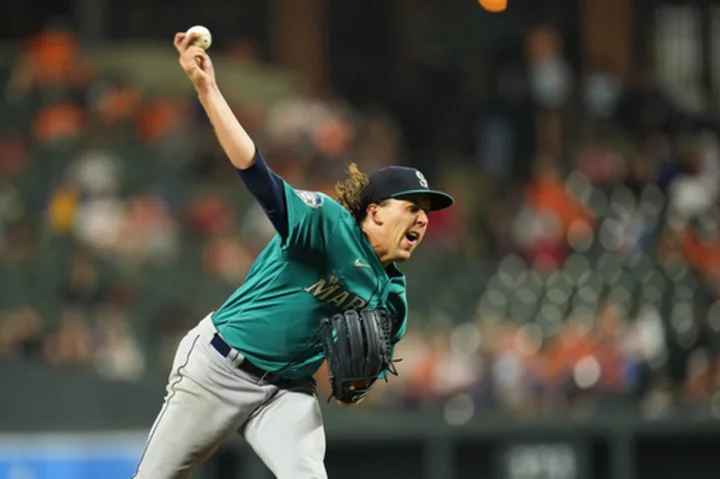 Mariners score 7 in the 8th to cap a 13-1 win over the Orioles