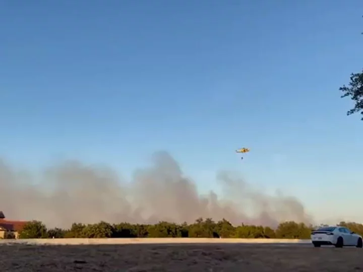 Austin-area wildfire has destroyed an apartment building and damaged at least 3 others