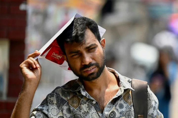 Bangladesh shuts schools, cuts power in longest heatwave in decades