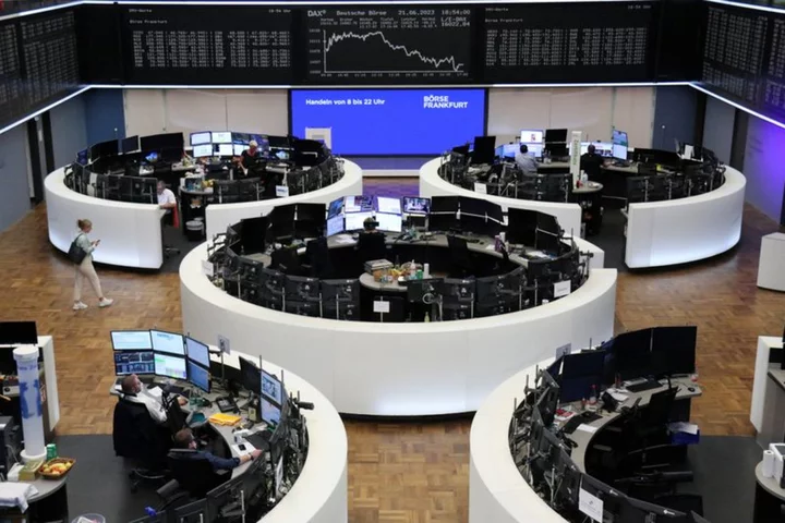 European shares slide at open on rate hike worries