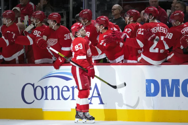 Andrew Copp, Alex DeBrincat each score twice, Red Wings beat Penguins 6-3